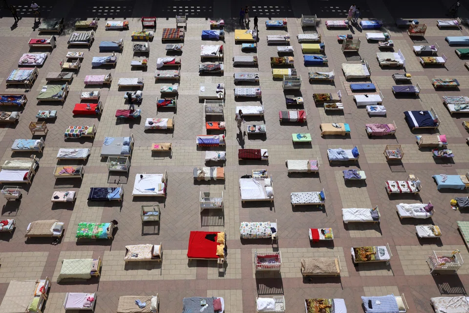 Some 230 empty beds are set up on Jerusalem Municipality Square on Oct 30, signifying the hostages held by Hamas in Gaza. The conflict in the Middle East dominated the EU summit in Brussels last week.