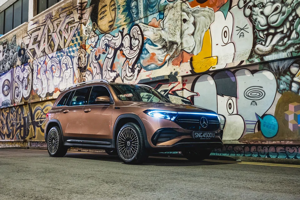 The batteries live under the floor, where their weight keeps the body from lurching in corners.