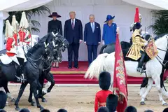 First Lady Melania Trump, US President Donald Trump, King Charles III and Queen Camilla inspect the troops during the State visit by Trump at Windsor Castle. 