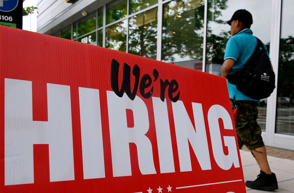 “Help Wanted” signs are plastered in front of restaurants and other businesses in the United States, where there were more than 11 million job openings in late July, or two for every employment seeker.