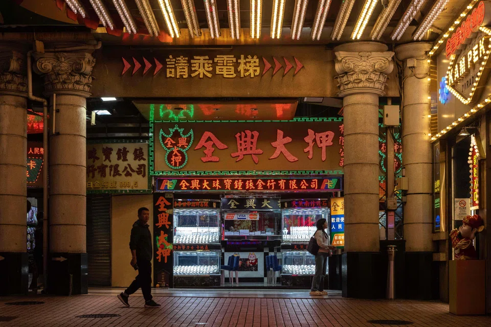A pawnshop next to Casino Lisboa in Macau.  The city’s six casino operators managed to renew their licences in 2022 only after they pledged to invest in other sectors.