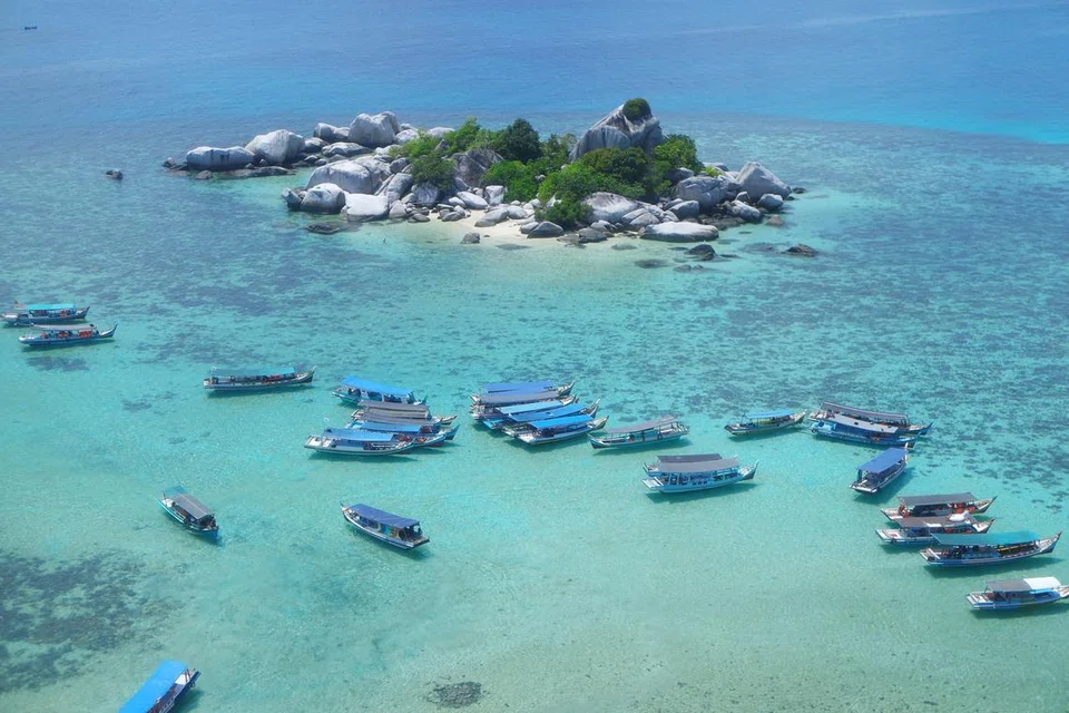 Belitung is a resort destination with white-sand beaches for travellers seeking to snorkel and island-hop. 