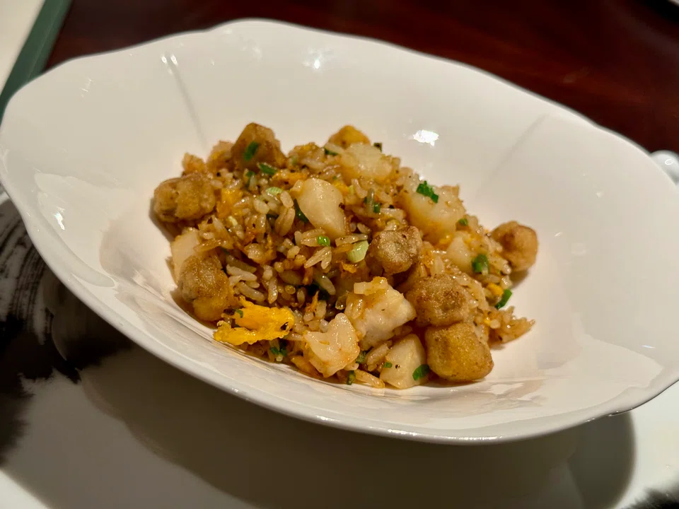 Seafood fried rice with truffle and foie gras.