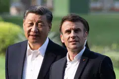 French President Emmanuel Macron (right) will be keen to nudge Chinese President Xi Jinping into pressuring Moscow to halt operations in Ukraine.