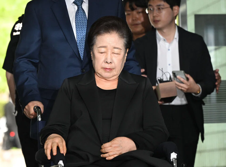 Unification Church leader Han Hak Ja arrives in a wheelchair for a court hearing in Seoul, South Korea, Sep 22, 2025.