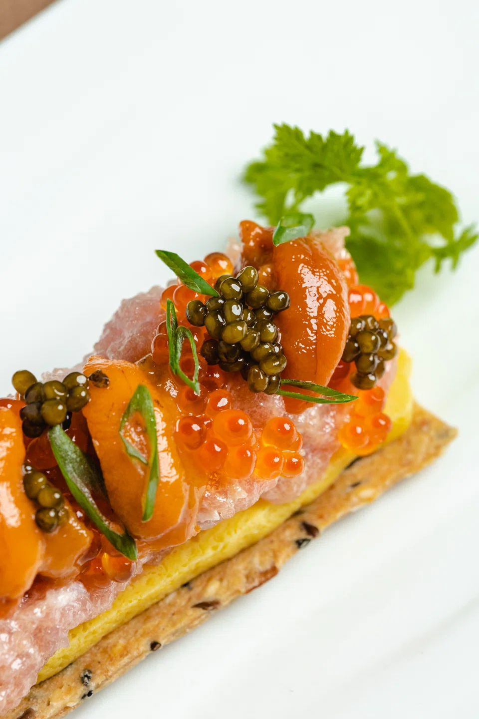 UNO features Negitoro, uni, caviar and seaweed on a cracker