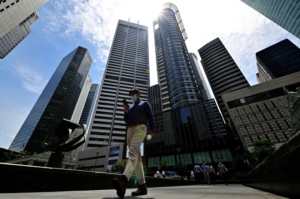 As Singapore rolls back pandemic measures, such as the wearing of masks, it is growing more attractive relative to financial rival Hong Kong.