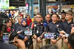 RDU secretary-general Ravi Philemon (centre) introduced potential candidates on the evening of April 10 at Senja Hawker Centre.