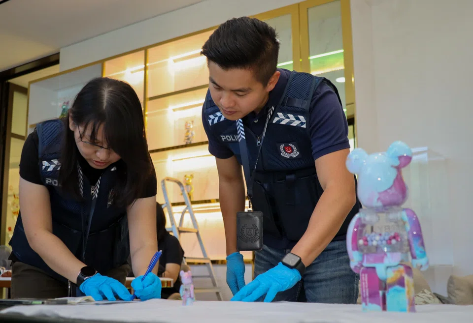 The money launderers held millions in cryptocurrency, bags from top brands and glitzy cars. Also in the mix, collectible statues known as BE@RBRICKs, golf club memberships and a Daniel Arsham x Dior Eroded Basketball sculpture worth US$13,333.