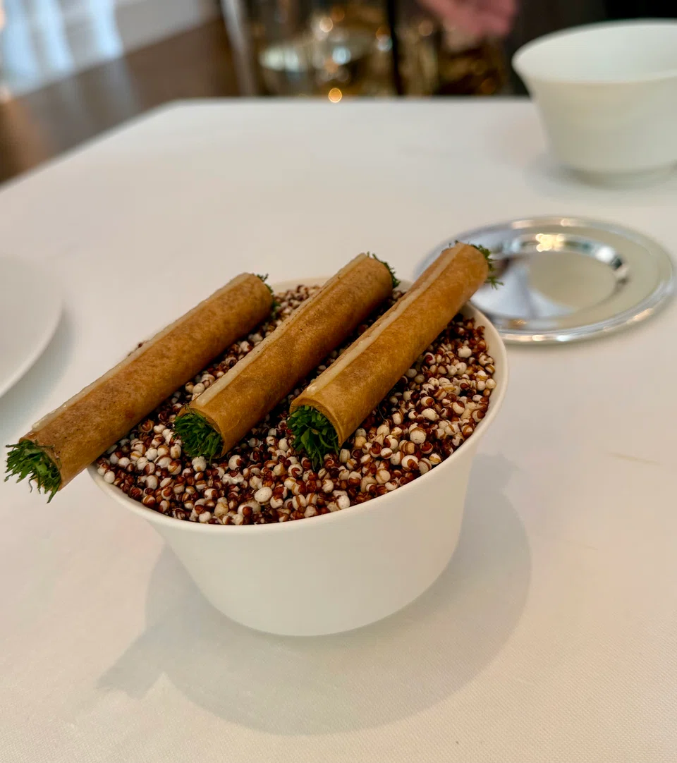 Hae bee hiam – crispy straws filled with spicy shrimp.