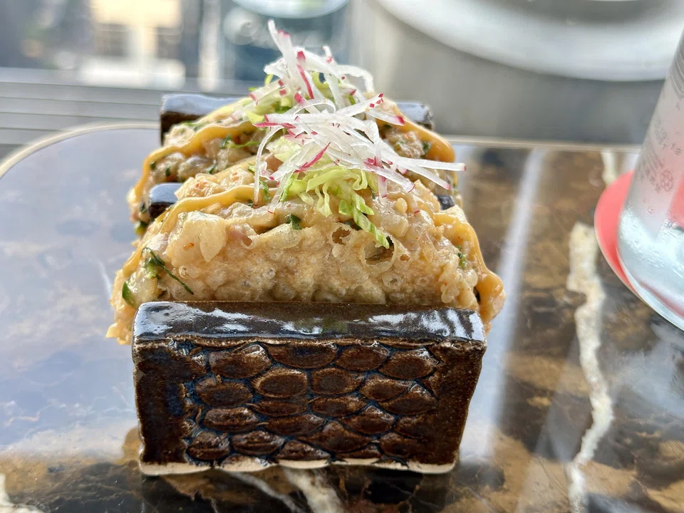 Crispy yellowtail taquitos.