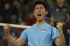 Singapore's badminton star Loh Kean Yew celebrates after the win over China's Li Shifeng on Thursday that saw him book a place in the quarter-finals at the Paris Olympics.