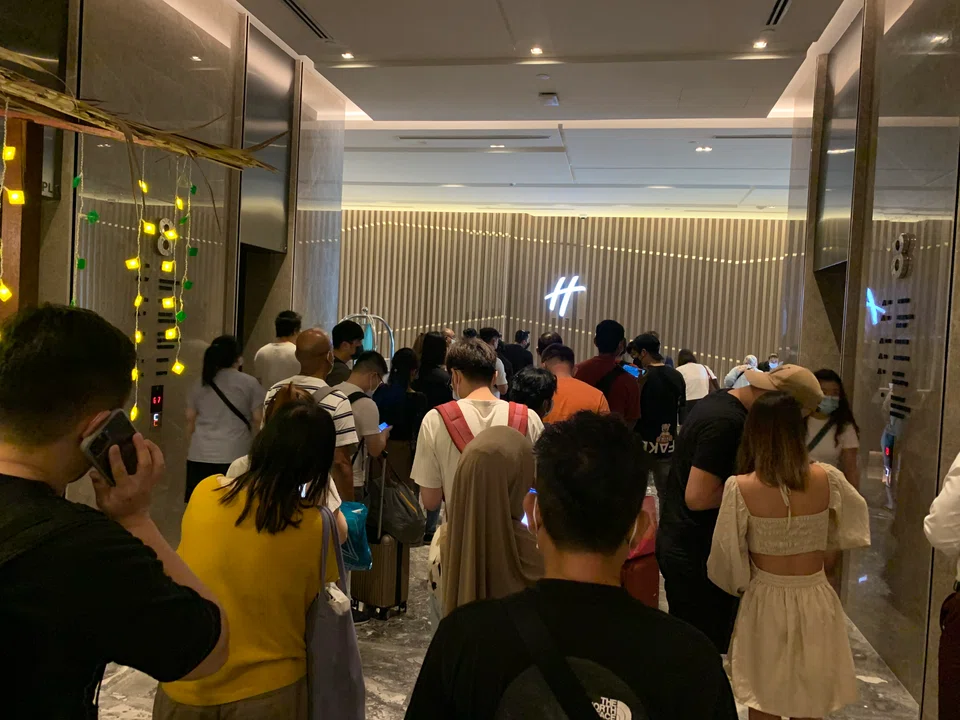 A long check-in queue at a hotel in Johor Baru. While happy to see an influx of travellers, many hotel operators are struggling to maintain service quality amid a manpower shortage.