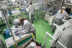 Japan's headline sentiment index for big manufacturers rose to +13 in June from +11 in March, slightly exceeding a median market forecast for a reading of +12, a survey showed on Monday.