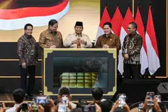 Indonesia's President Prabowo Subianto (centre) deposits a gold bar during the inauguration of the bullion banking service by Indonesia's state-owned pawnbroker and financial services company Pegadaian and Bank Syariah Indonesia on Feb 26.