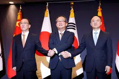 Left to right: Japan Senior Deputy Minister for Foreign Affairs Takehiro Funakoshi, South Korea Deputy Foreign Minister for Political Affairs Chung Byung-won, and China Assistant Foreign Minister Nong Rong during their meeting in Seoul, South Korea.
