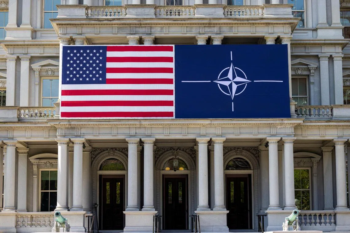 The US and Nato flags in Washington, DC, ahead of the military alliance's summit from Jul 9 to 11.