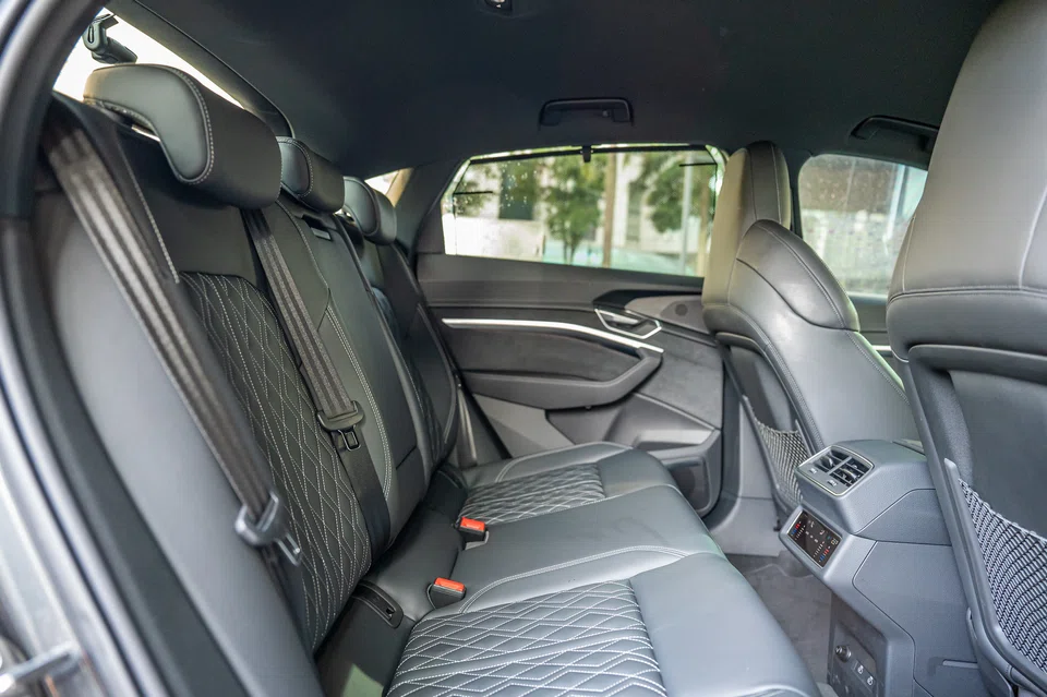  has a fastback silhouette and smooth front end. with only a slender opening for cooling air to slip into the engine bay.