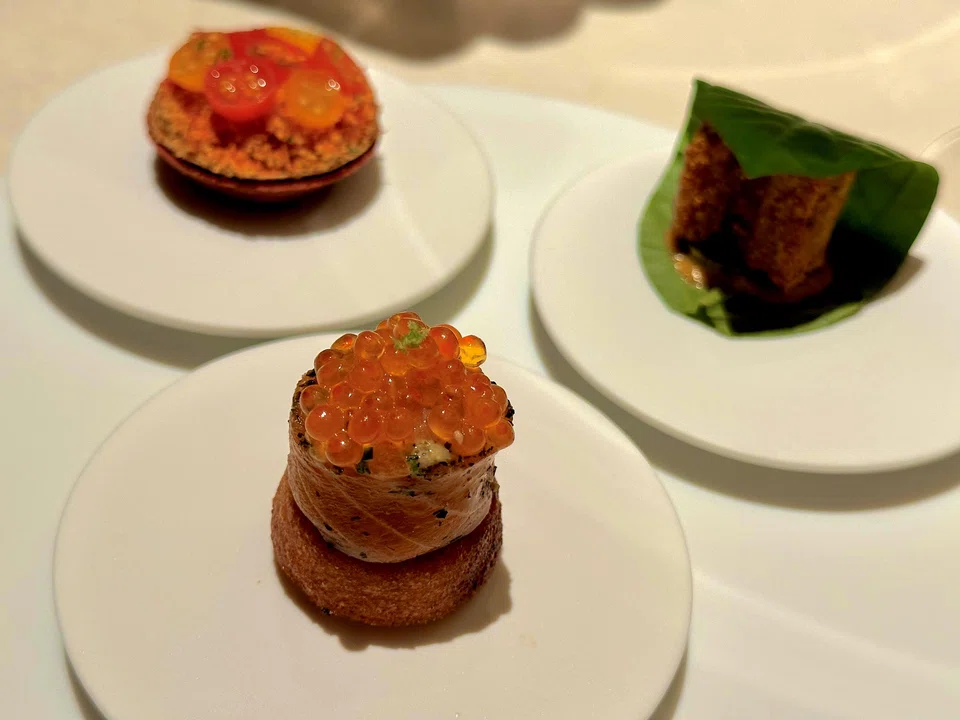 A trio of snacks to start the meal.