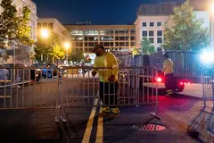 Workers set up security barricades outside the E Barrett Prettyman US Courthouse in Washington, DC, on Aug 2, ahead of the arraignment of former US President Donald Trump. Trump was indicted on Aug 1 over his efforts to overturn the results of the 2020 election.