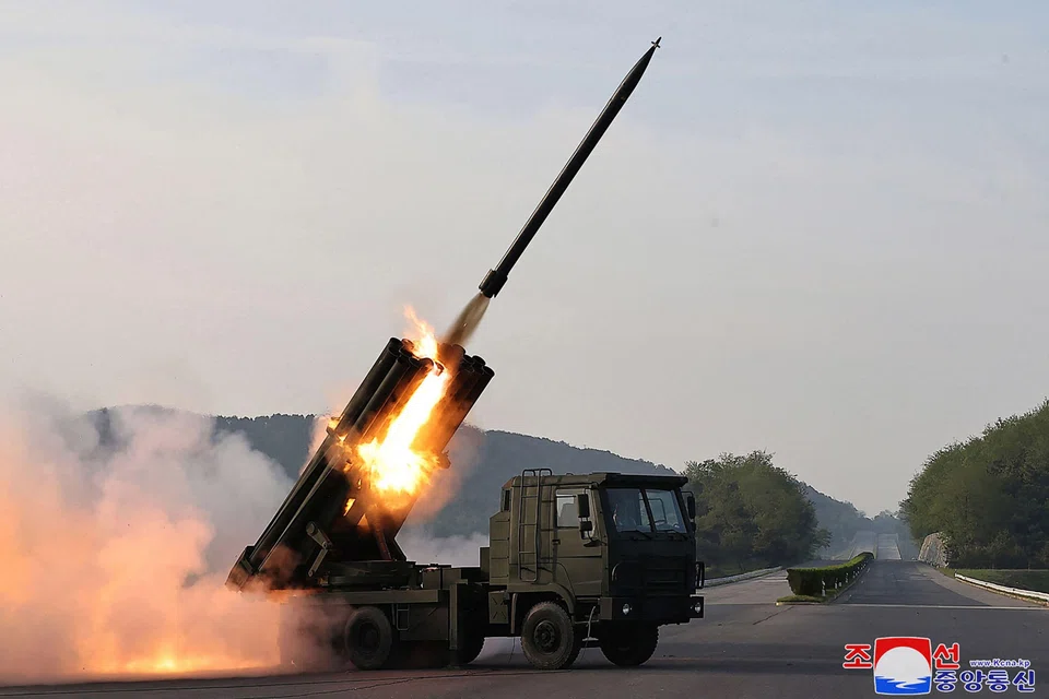 The test firing of a 240mm multiple rocket launcher system at an undisclosed location in North Korea on May 11, 2024.  The latest satellite launch may have failed, according to Japan and South Korea. Seoul has detected debris from the rocket in the sea.
