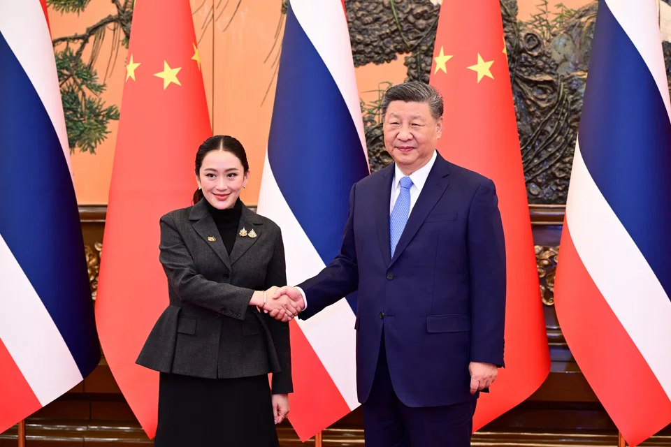 Chinese President Xi Jinping and Thai Prime Minister Paetongtarn Shinawatra shake hands at the Great Hall of the People in Beijing on Feb 6. The Thai leader’s official visit to China from Feb 5 to Feb 8 is her first since taking office in August, marking the 50th anniversary of diplomatic ties between the two countries.