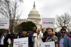 Supporters of TikTok gather near the Capitol in Washington on Mar 13. Seen from Washington, the social media app is a powerful tool placed in the hands of a company with ties to a government that’s regarded as America’s leading global rival.
