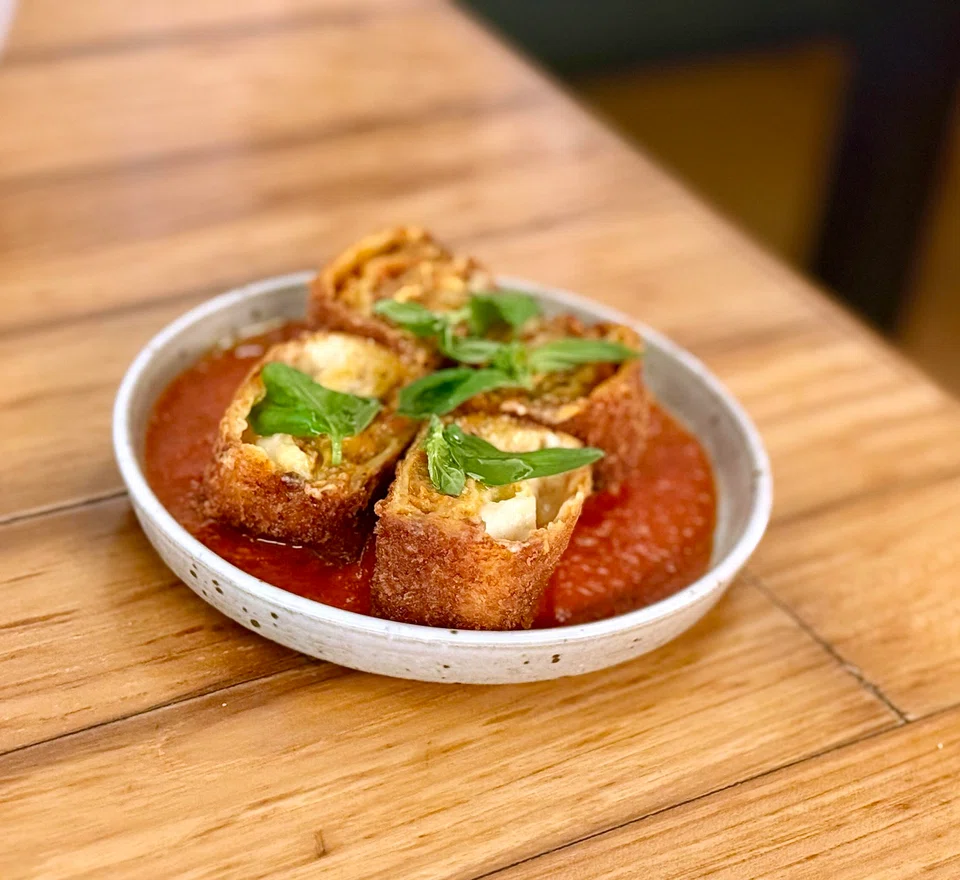 Lasagne nuggets are crumbed and deep-fried.