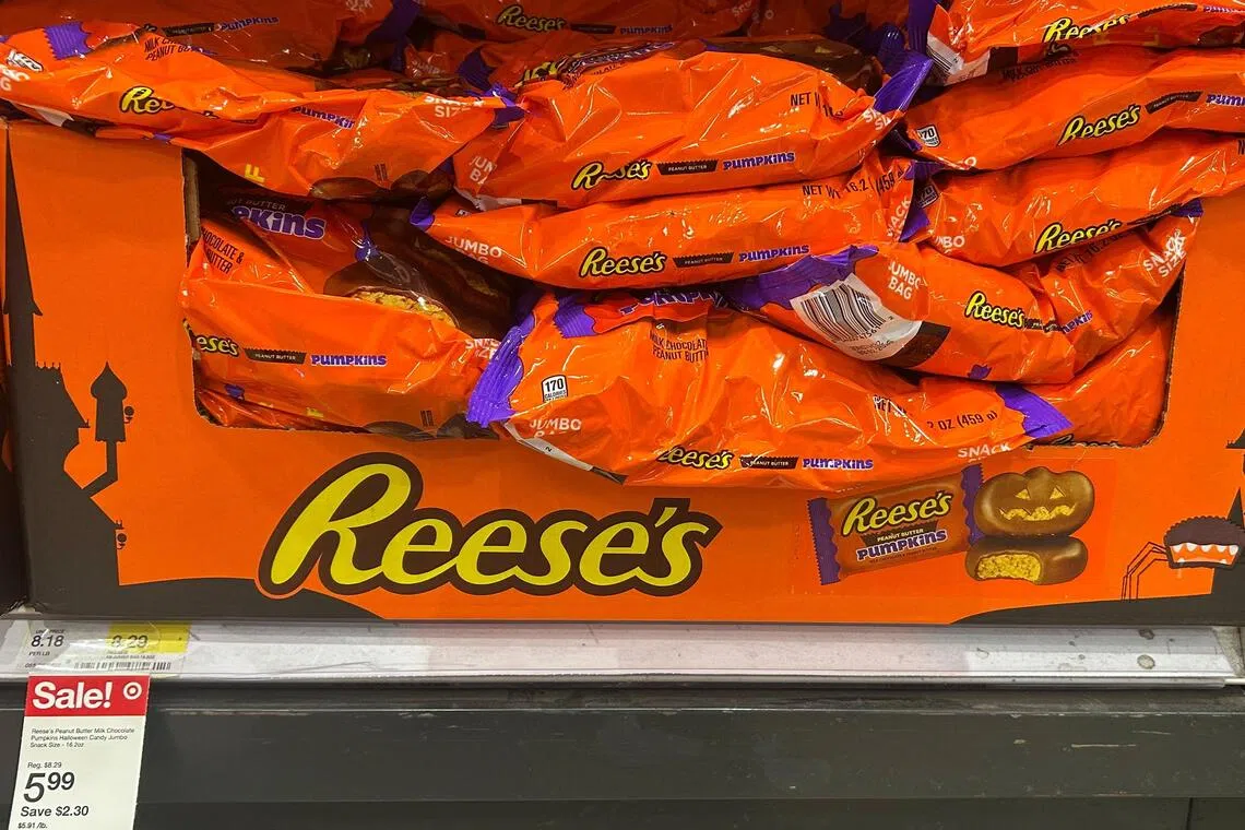 US consumers are tightening spending in general due to an uncertain economy and government shutdown, and the rising cost of sweets has further prompted them to trim their candy budgets.
