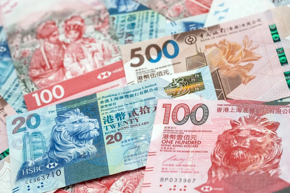 Measures of Hong Kong dollar’s funding costs jumped in both foreign-exchange and money markets, as traders borrowed cash to pile into surging equities and banks hoarded liquidity before quarter-end regulatory checks.