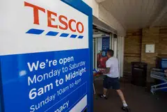 A customer enters a Tesco Plc supermarket in Potters Bar, UK, on Wednesday, June 15, 2022. Tesco are due to report earnings on Friday. Photographer: Chris Ratcliffe/Bloomberg