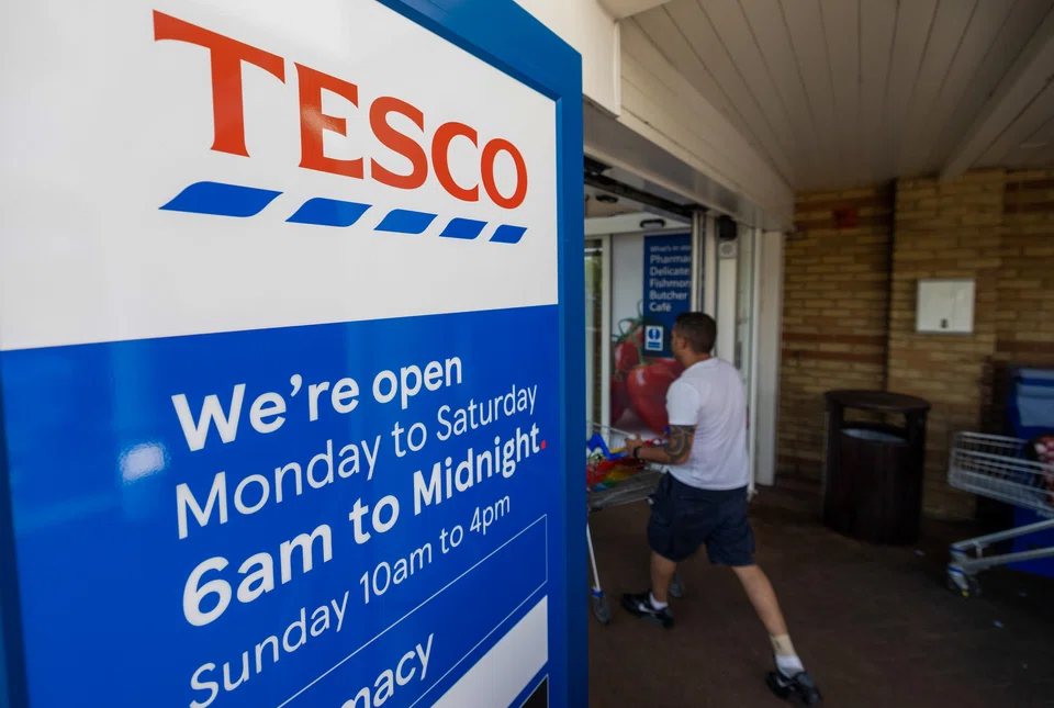 A customer enters a Tesco Plc supermarket in Potters Bar, UK, on Wednesday, June 15, 2022. Tesco are due to report earnings on Friday. Photographer: Chris Ratcliffe/Bloomberg