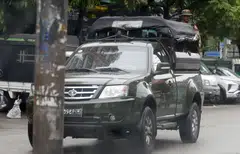 A military vehicle patrolling a street in Yangon. Myanmar's largest micro-lender, the PGMF, will cease operations for good on Jun 30, 2023.