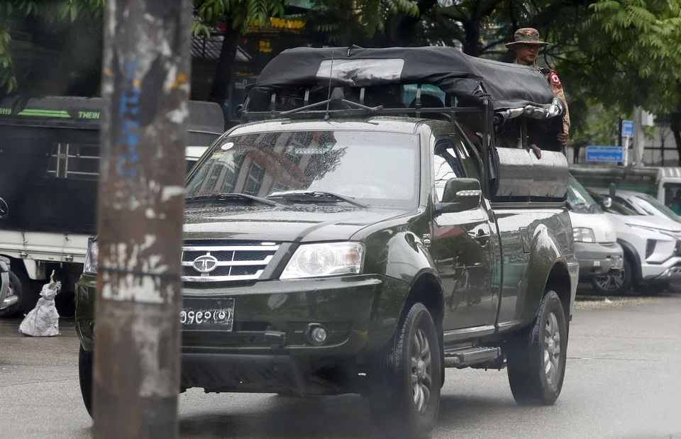 A military vehicle patrolling a street in Yangon. Myanmar's largest micro-lender, the PGMF, will cease operations for good on Jun 30, 2023.