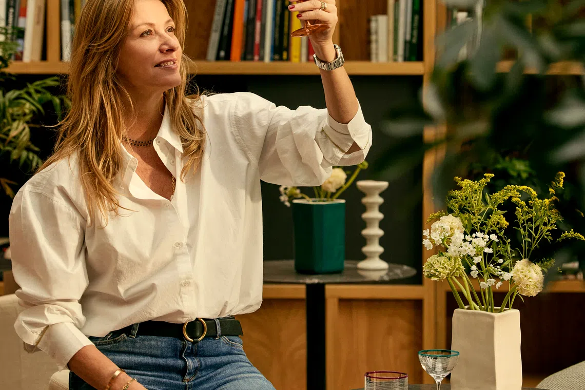 Sarah Poniatowski, founder, designer and chief executive officer of Maison Sarah Lavoine, with the three cocktail glasses she designed. 