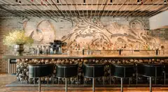 A bar at private club 1880 designed using over 300 teapots from England. 