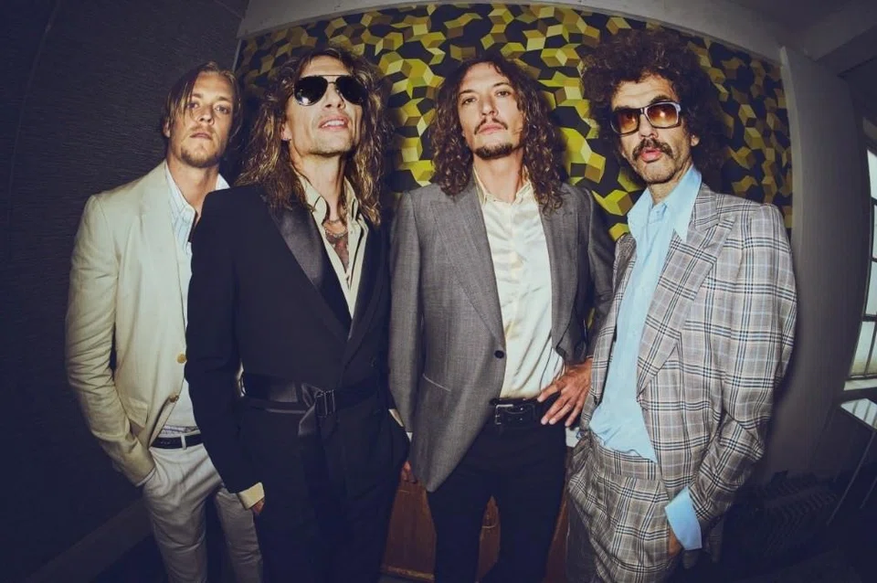 The Darkness were formed by brothers Justin and Dan Hawkins in 2000.
