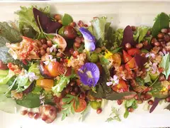 Culinary collective Gastrogeography of Singapore is serious about its "eat local" philosophy. So it created the Singapore salad, a delicious medley of local greens such as cranberry hibiscus, false ginseng, purslane and gynura.