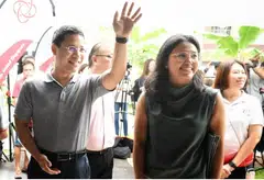 National Development Minister Desmond Lee and trade unionist Natasha Choy at an event held in Jalan Mas Kuning on April 2.