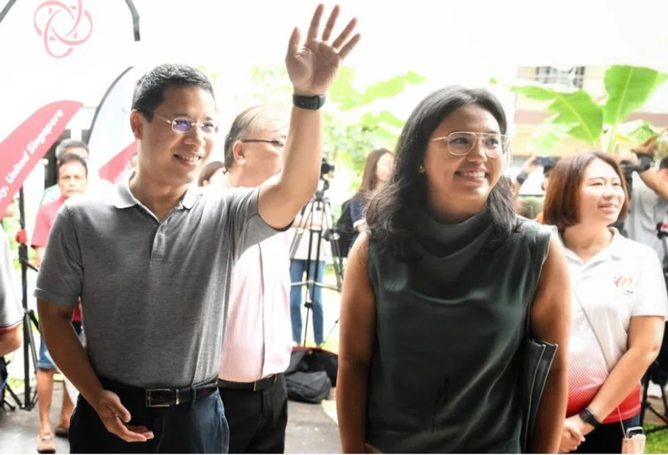 National Development Minister Desmond Lee and trade unionist Natasha Choy at an event held in Jalan Mas Kuning on April 2.