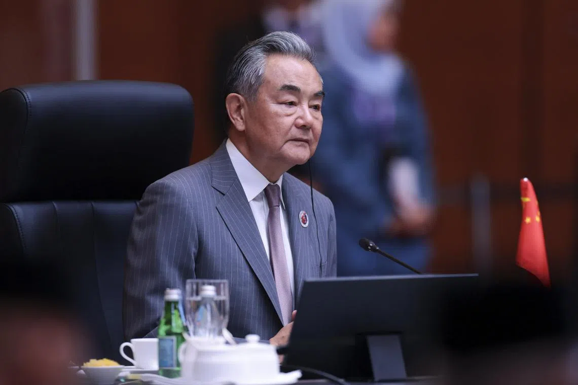Chinese Foreign Minister Wang Yi attends the Asean Post-Ministerial Conference with China at the Kuala Lumpur Convention Centre in Kuala Lumpur, Malaysia, July 10, 2025.  