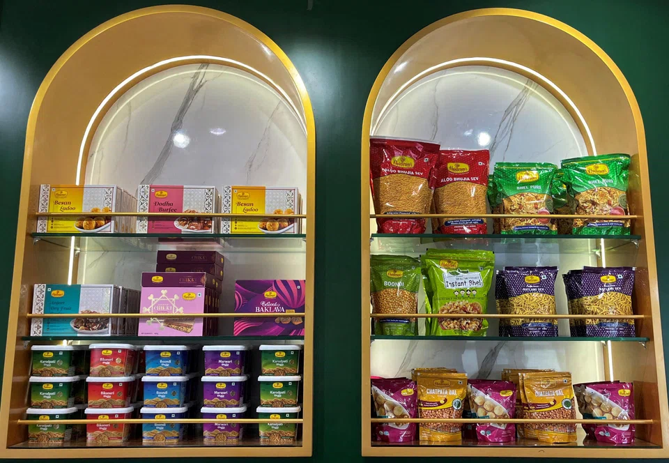 Snacks inside a Haldiram's restaurant in Mumbai. 
The company is estimated by Euromonitor International to hold a near 13% share of India’s US$6.2 billion savoury snacks market.