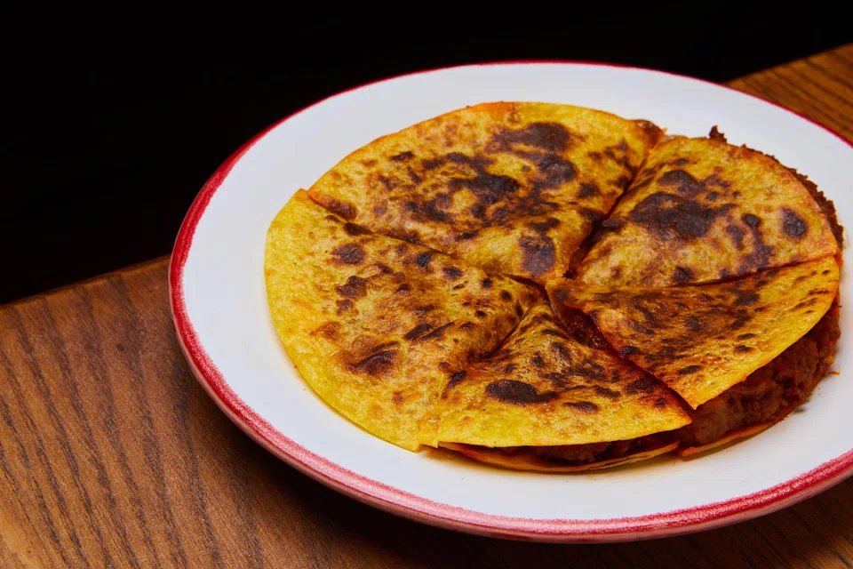 Minced lamb and cheese make a comforting keema quesadilla.