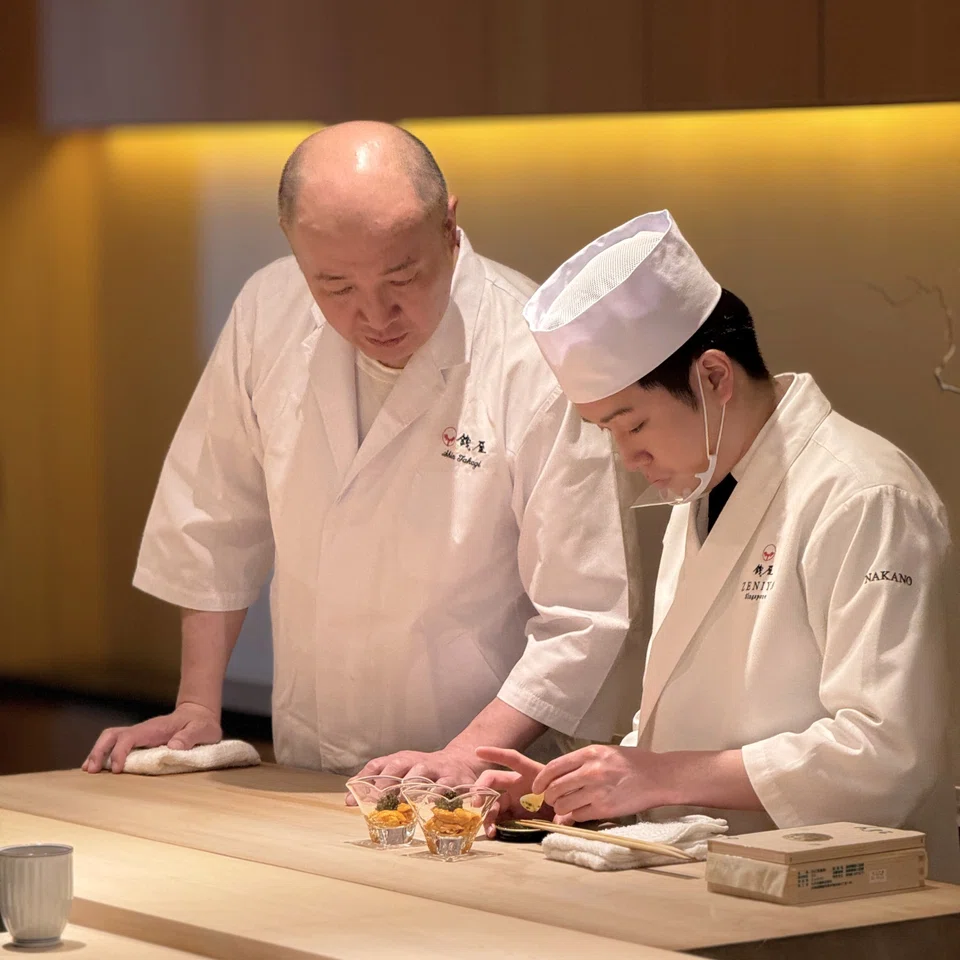 Chef-owner Shin Takagi (left) of the two-Michelin-starred Zeniya in Kanazawa.
