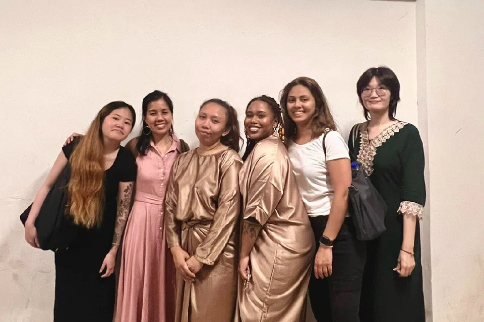 By providing their staff with vocational training, The Nail Social's co-founders Cheryl Ou (second from left) and Germaine Monteiro (second from right) have uplifted lives, including that of Madam Fyza Daud (third from left) who has since gained the confidence to start her own food business.