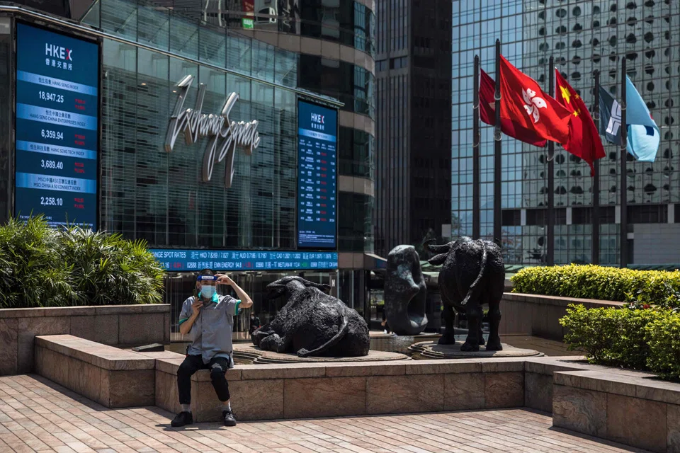 The Hang Seng Index sank 1.71 per cent or 353.92 points to 20,284.60.