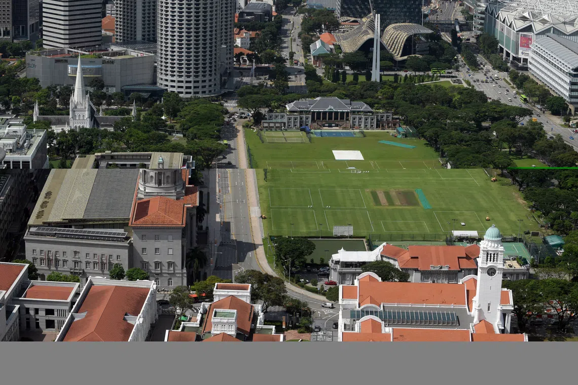 The old City Hall (left) and the Padang (right), with other historical buildings around, on 7 April 2021.
