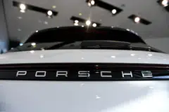 Porsche said expenses tied to expanding the product portfolio with more combustion engine and plug-in hybrid models will drop return on sales to the 10 to 12 per cent range this year.