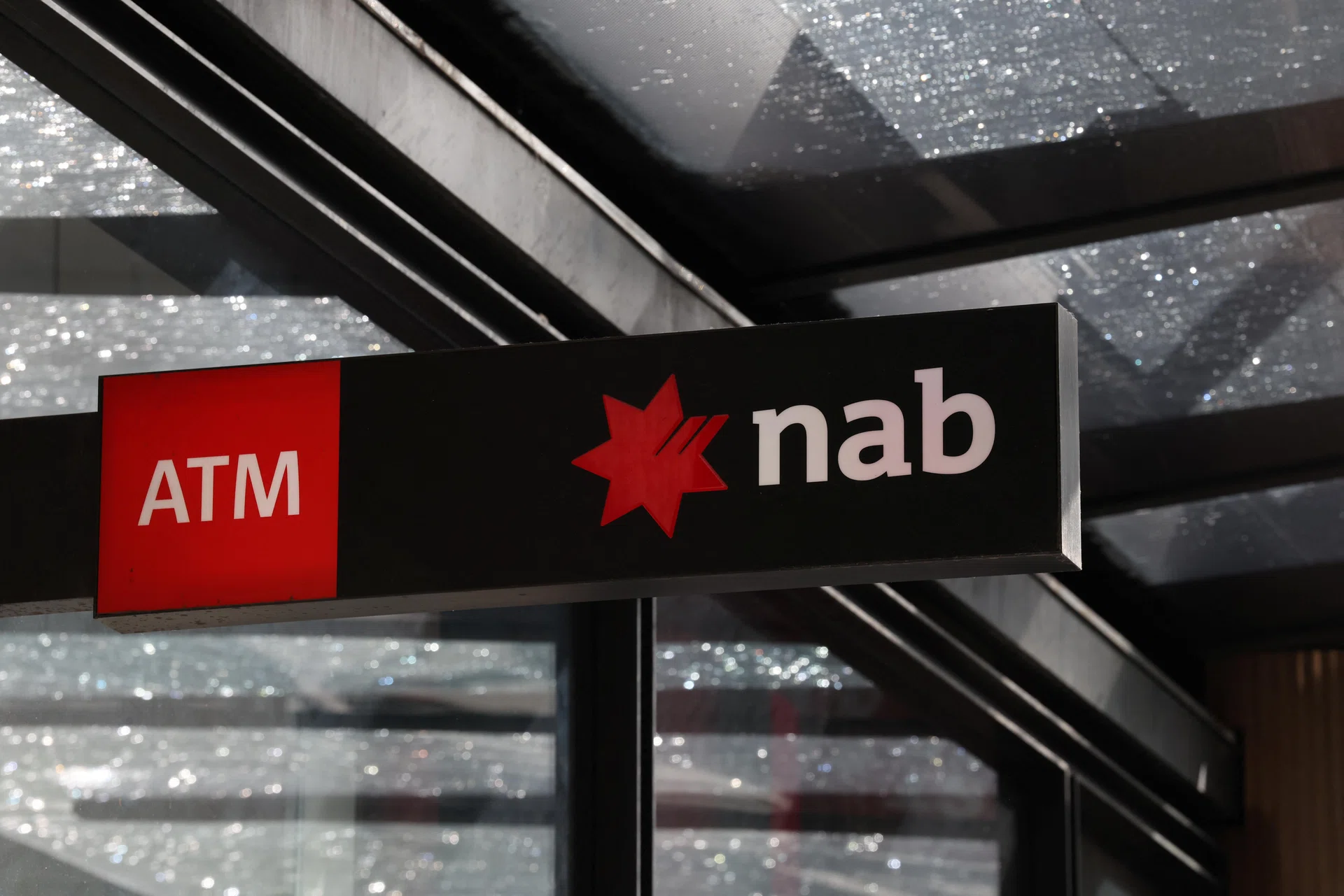 NAB to cut 410 support roles, shift some bank work to India