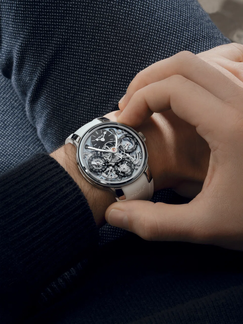 The latest LM Perpetual EVO is in titanium, but has a new icy blue dial plate. Like the earlier versions, it comes with an integrated rubber strap.